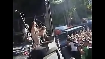 Couple fuck on stage during a concert