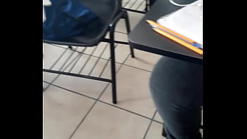 Young girl rides another in the middle of class