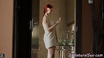 Cute redhead fingering after shower