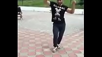 Russian dagestan arab guy is dancing amazing arabian dance in the street