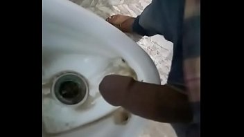 Indian guy pissing