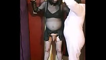 bisexual crossdresser in bondage blindfolded and feed his own piss by masked girlfriend