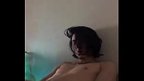 teen boy playing on webcam
