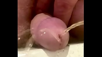 Extreme close up small Dick piss