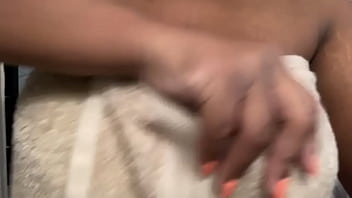 Black girl takes off towel to show big pretty tits