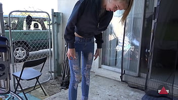 Skinny Girl in Tight Jeans Sucks Pop