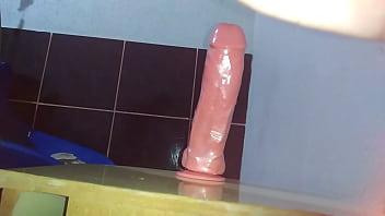 Playing with dildo 24 cm